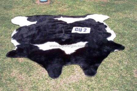 Black and white cowhide rug