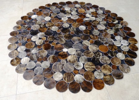 Circles brindle cowhide rug